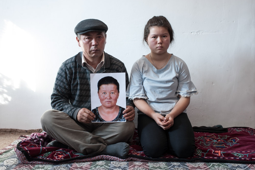 Muralu Tusypjuly and his 13-year-old daughter have been missing their wife and mother since November 2018, who is being held captive in a re-education camp in Xinjiang. The Russian photographer Konstantin Salomatin travelled to Almaty in November 2018 for the following portrait series. / Photo: Konstantin Salomatin, n-ost 